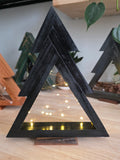 Handmade black pine Christmas tree with lights and walnut base, 12 inches tall and 9.5 inches wide