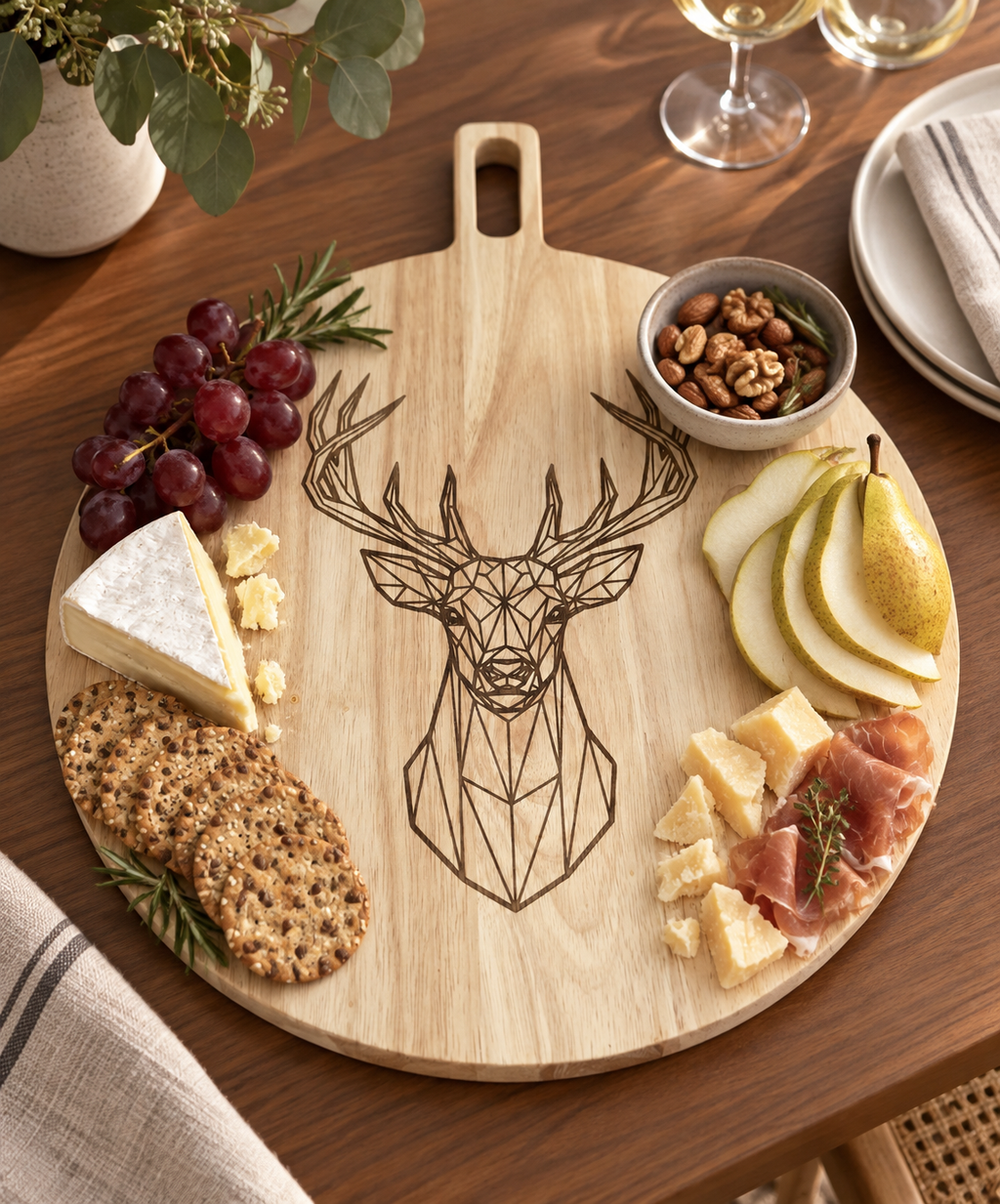 Geometric stag serving board styled with cheese fruit and crackers