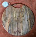 Golden Birds round acacia serving board front with brass handle