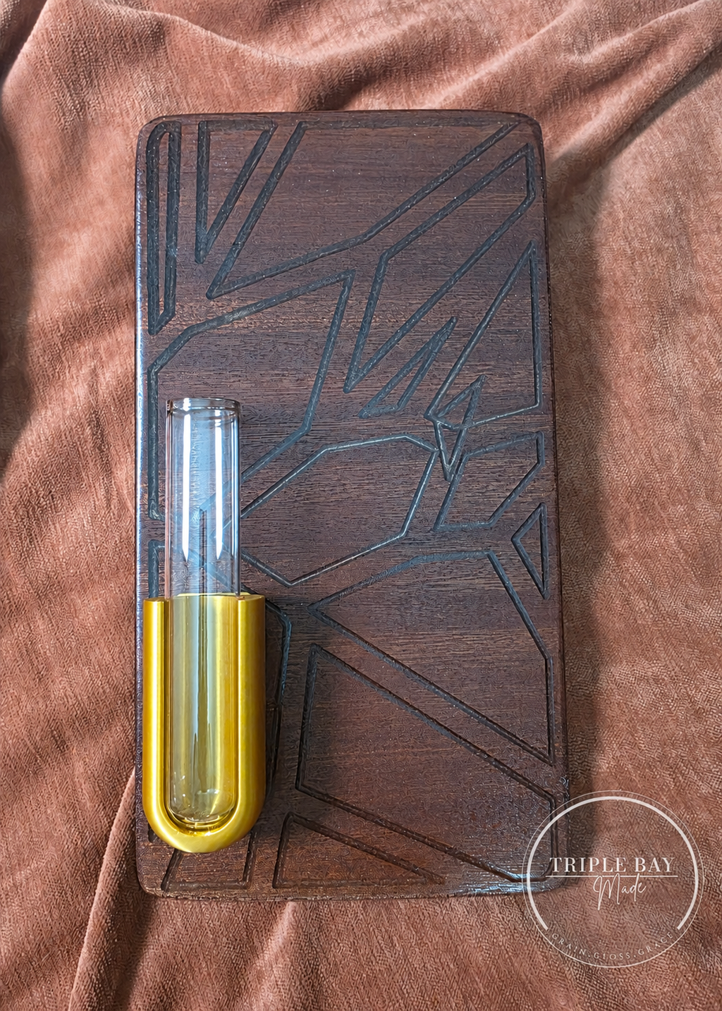 One-of-a-kind bubinga and golden resin propagation wall art with empty tube