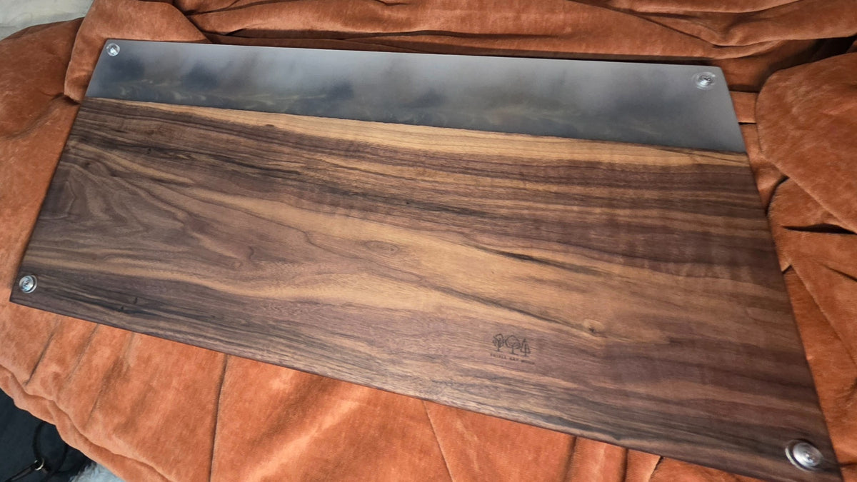 Back of handcrafted walnut and resin board with four protective feet