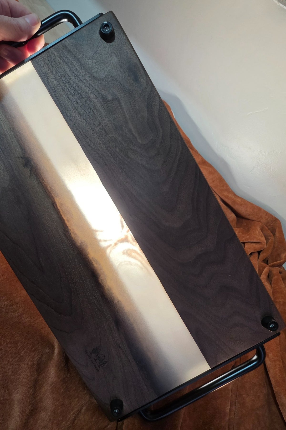 Detail of smoky pearlescent resin and dark walnut grain